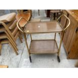 A MID 20TH CENTURY TWO TIER GALLERIED METALWARE TROLLEY