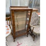 A SHINY WALNUT DISPLAY CABINET ON CABRIOLE LEGS, 23" WIDE