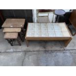 A NEST OF THREE OAK TABLES AND TILE TOP COFFEE TABLE