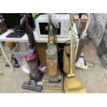 THREE VACUUM CLEANERS TO INCLUDE A DYSON DC41, A HOOVER VACUUM AND A FURTHER DYSON