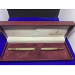 A BOXED INGERSOLL GOLD PLATED PEN