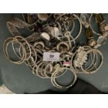 A SELECTION OF WHITE METAL JEWELLERY TO INCLUDE SEVERAL BANGLES
