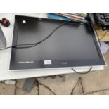 A 23" TECHNIKA TELEVISION WITH REMOTE CONTROL BELIEVED IN WORKING ORDER BUT NO WARRANTY