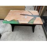 A MODERN PINE COFFEE TABLE INSET WITH EPOXY RESIN DECORATION, 24x16"