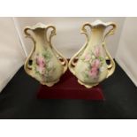 A PAIR OF VINTAGE DECORATED TWIN HANDLED VASES