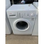 A WHITE BOSCH WASHING MACHINE BELIEVED IN WORKING ORDER BUT NO WARRANTY