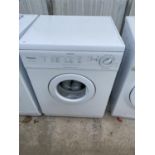 A WHITE HOTPOINT AQUARIUS TUMBLE DRYER BELIEVED IN WORKING ORDER BUT NO WARRANTY