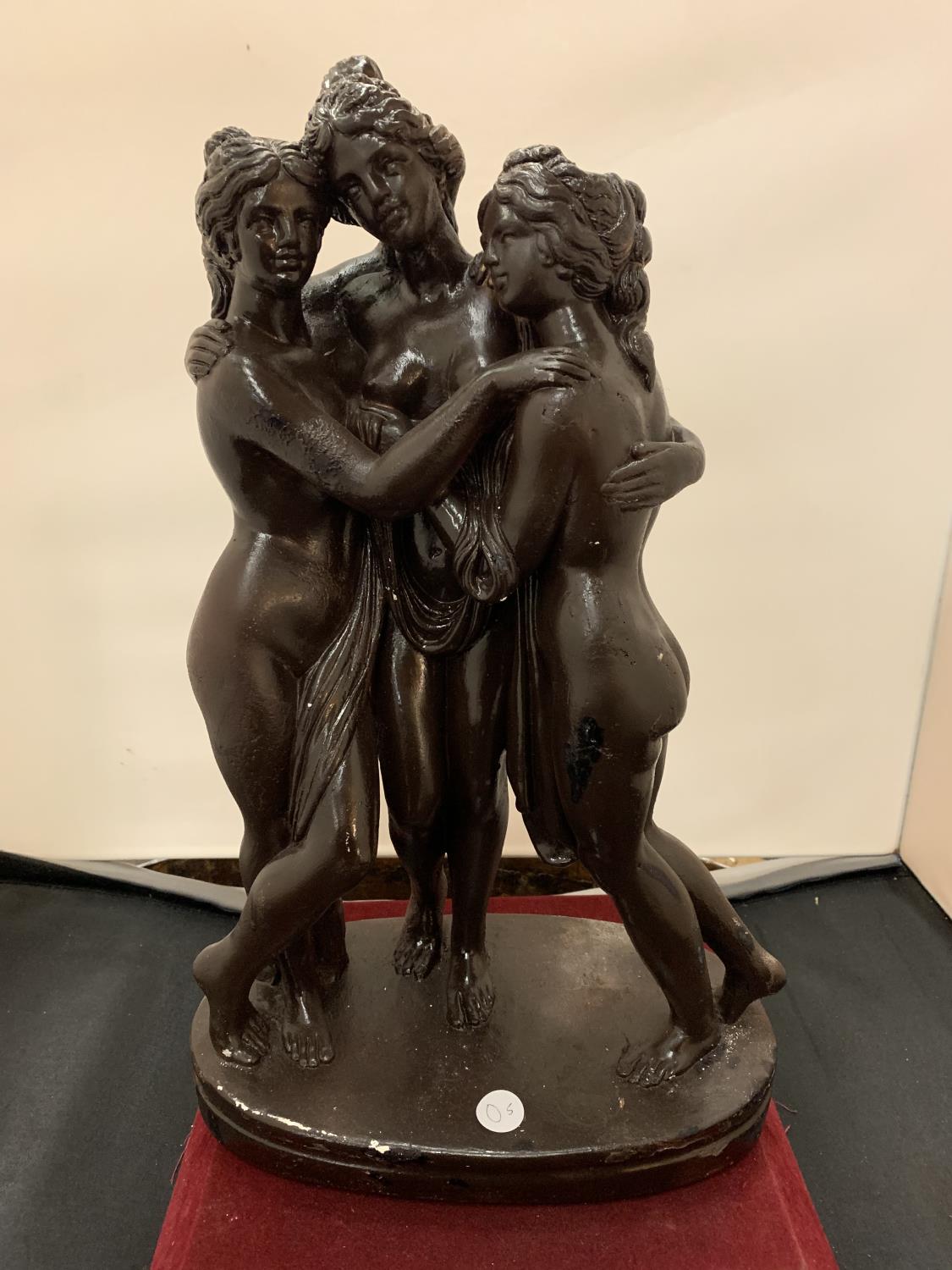 AN ORNAMENT DEPICTING THE THREE MUSES - HEIGHT 43CMS