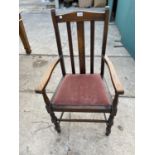 AN EARLY 20TH CENTURY OAK CARVER CHAIR