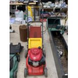 A PETROL LAWN MOWER WITH HONDA ENGINE AND A WOLF GARTEN GRASS BOX