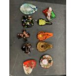A COLLECTION OF COLOURED GLASS DECORATIVE PENDANTS