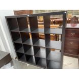 A SET OF MODERN BLACK OPEN DISPLAY SHELVES, 16 DIVISION