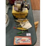 AN ASSORTMENT OF VINTAGE ANGLING ITEMS TO INCLUDE A DAM SPINNER, FLOATS AND A SALT WATER TROLLING