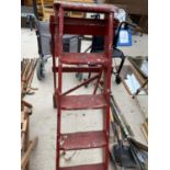 A SET OF VINTAGE G A JONES WOODEN STEP LADDERS