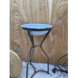 A VINTAGE ENAMEL WASH BASIN ON A WROUGHT IRON STAND
