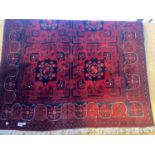 A RED AND BLUE PATTERNED RUG