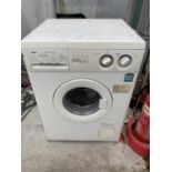 A WHITE ZANUSSI WASHING MACHINE BELIEVED IN WORKING ORDER BUT NO WARRANTY