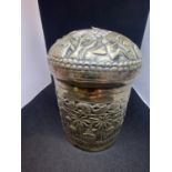 A CONTINENTAL BELIEVED SILVER TEA CADDY WITH AN ORNATE DESIGN