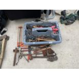 A LARGE ASSORTMENT OF HAND TOOLS TO INCLUDE PLIERS, AHMMERS, MOLE GRIPS ETC