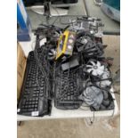 A LARGE COLLECTION OF COMPUTER PARTS TO INCLUDE KEYBOARDS, CURCUIT BOARDS AND FANS ETC
