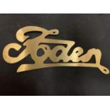 A BRASS "FODEN" RADIATOR BADGE