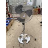 AN UPRIGHT FLOOR FAN BELIEVED IN WORKING ORDER BUT NO WARRANTY