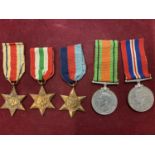 FIVE WW2 MEDALS - A 1939 - 45 MEDAL. A DEFENCE MEDAL, A 1939 - 45 STAR, AN ITALY STAR AND AN