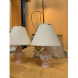A VINTAGE FLORAL LAMP WITH SHADE AND A PAIR OF PINK BEDSIDE TABLE LAMPS