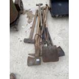 AN ASSORTMENT OF VINTAGE GARDEN TOOLS TO INCLUDE SPADES,FORKS AND AXES ETC