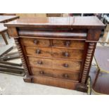 A VICTORIAN MAHOGANY CHEST OF TWO SHORT AND THREE LONG DRAWERS, TURNED FROM COLUMNS AND SECRET