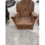 A VINTAGE CHILDS FIRESIDE CHAIR