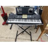 A YAMAHA ELECTRIC KEYBOARD WITH STAND