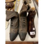 A PAIR OF VICTORIAN BUTTON FASTENING LEATHER BOOTS