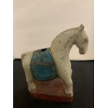 A PAINTED WOODEN HORSE