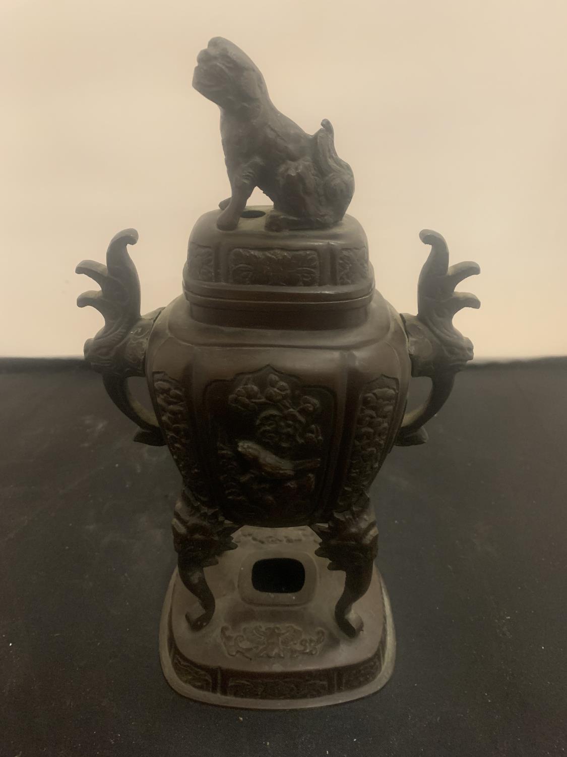 AN EARLY BRONZE BURNER WITH A FIGURE OF A DOG ON THE LID