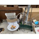 AN ASSORTMENT OF ITEMS TO INCLUDE A BATHROOM SINK AND TAP, A GARDEN SEEDER AND A HEATER ETC