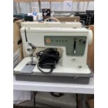 SINGER SEWING MACHINE BELIEVED IN WORKING ORDER NO WARRENTY