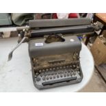 A VINTAGE REMINGTON RAND TYPE WRITER