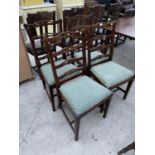 FOUR CARVED OAK DINING CHAIRS