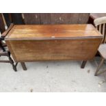 AN EARLY 20TH CENTURY INLAID MAHOGANY DROP LEAF DINING TABLE