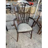 A SPINDLE BACK MAHOGANY CARVER ARMCHAIR