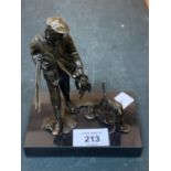 A BRONZE HUNTSMAN WITH HIS DOG ON A MARBLE PLINTH