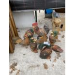 AN ASSORTMENT OF GARDEN ORNAMENTS TO INCLUDE WOODEN DUCKS ETC