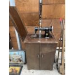 A VINTAGE SINGER SEWING MACHINE COMPLETE WITH CASE AND ORIGINAL FOOT PEDDLE AND INSTRUCTION MANUAL