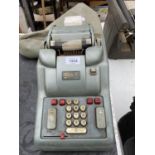 A VINTAGE ADDO-X TILL ADDING MACHINE