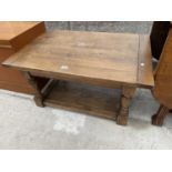 A MODERN OAK TWO TIER COFFEE TABLE ON TURNED LEGS, 35x24"