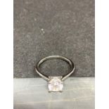 AN 18 CARAT WHITE GOLD DIAMOND RING HALLMARKED IN THE UK AS 18 CARAT TOTAL GOLD WEIGHT 2.5 GRAMS