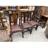 A QUEEN ANNE STYLE CHAIR AND THREE OAK DINING CHAIRS