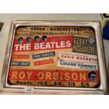 A VINTAGE STYLE METAL FRAMED ?THE BEATLES? ON THE STAGE AT ODEON MANCHESTER WALL ART PICTURE 44CM