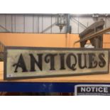 AN ILLUMINATED 'ANTIQUES SIGN'
